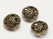 1 st metallp�rla med hj�rtan 17 x 8 mm. Bronsf�rgad